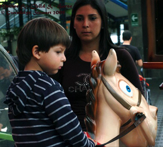 Photograph of MOTHER & 
SON & 'HORSE' in Lima, Peru, by GWENDOLYN STEWART, c. 2013; All Rights Reserved